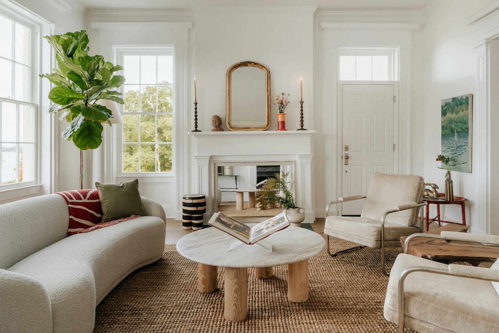 Bright Mediterranean villa interior with arched windows and sea light